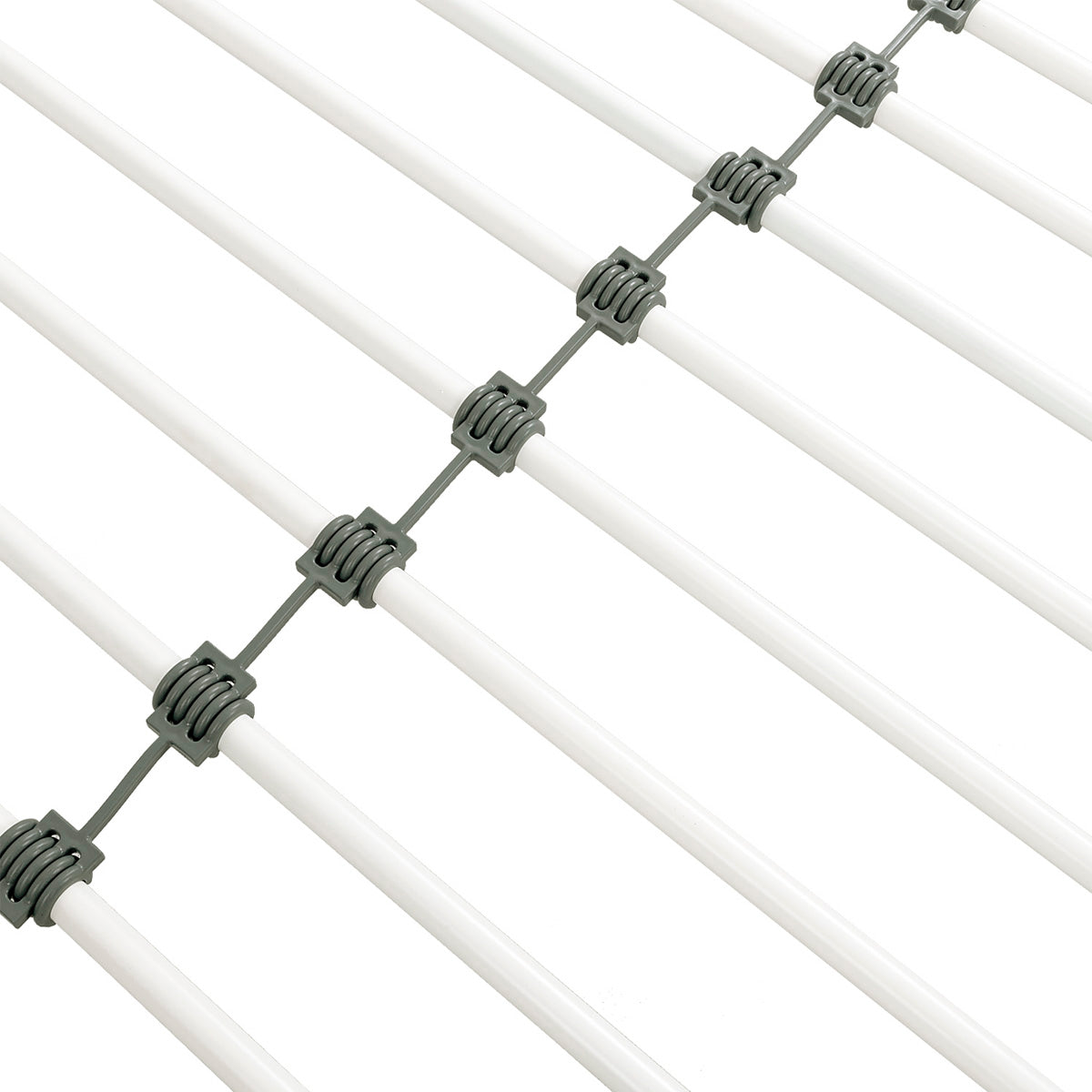 Détail du sommier en métal blanc du lit mezzanine DINO avec bureau 90x190 cm en finition mélamine chêne et métal blanc